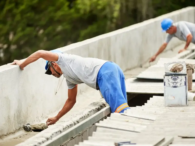men repairing a commercial roof