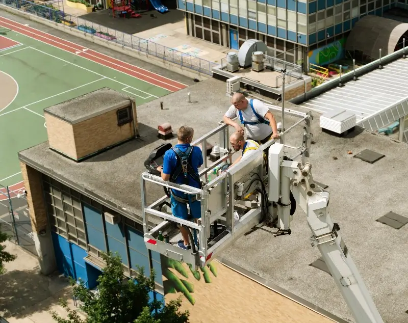 man working on commercial roof