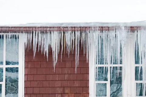 Home with ice dam forming on the roof in North Carolina