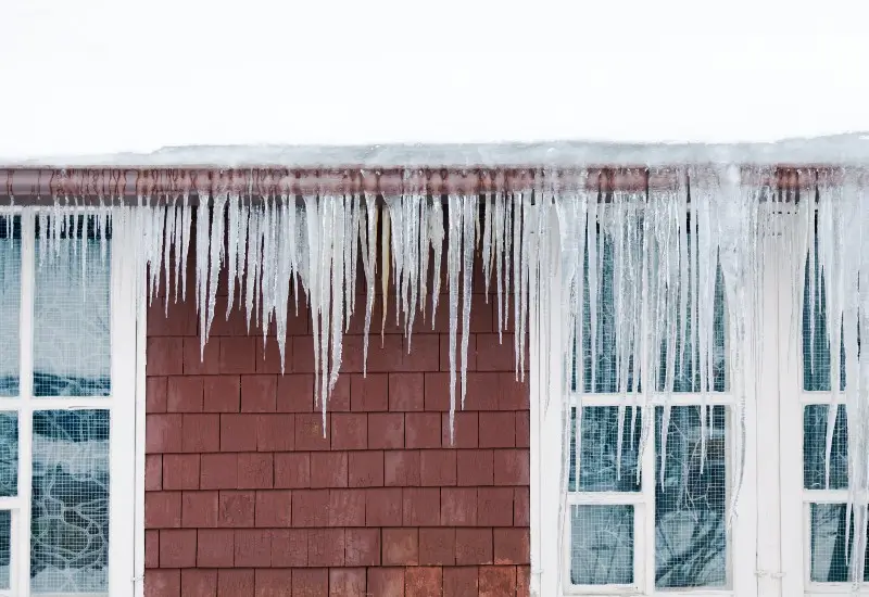 Home with ice dam forming on the roof in North Carolina